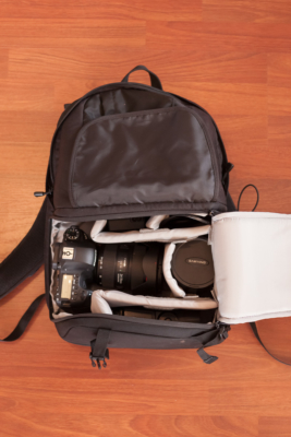 Lowepro Fastpack 250, loaded with Canon 6D, Canon EF 24-70 II L USM, Canon Speedlite 430EX II, Samyang 14mm f/2.8 Aspherical IF ED UMC and a few battery chargers and accessories in the larger pocket with easy access.