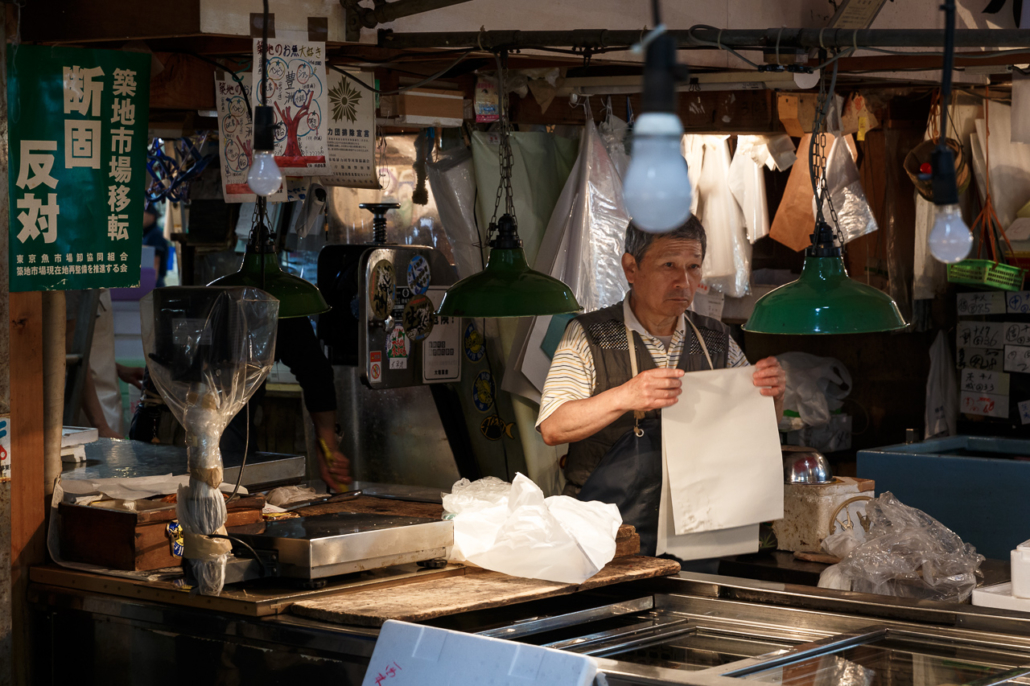 A worker at Tsukiji fish market, Tokyo, Japan.